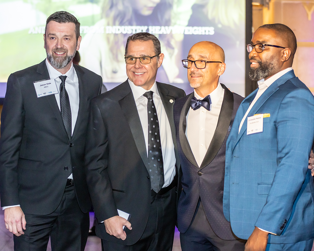Picture, from left to right: Jason Dale, Dean, Automotive Business School of Canada. Alan Bird, CEO, taq Automotive Intelligence. John  Currado, President, taq Automotive Intelligence. Christopher Nabeta, Founder, Accelerate Auto.
